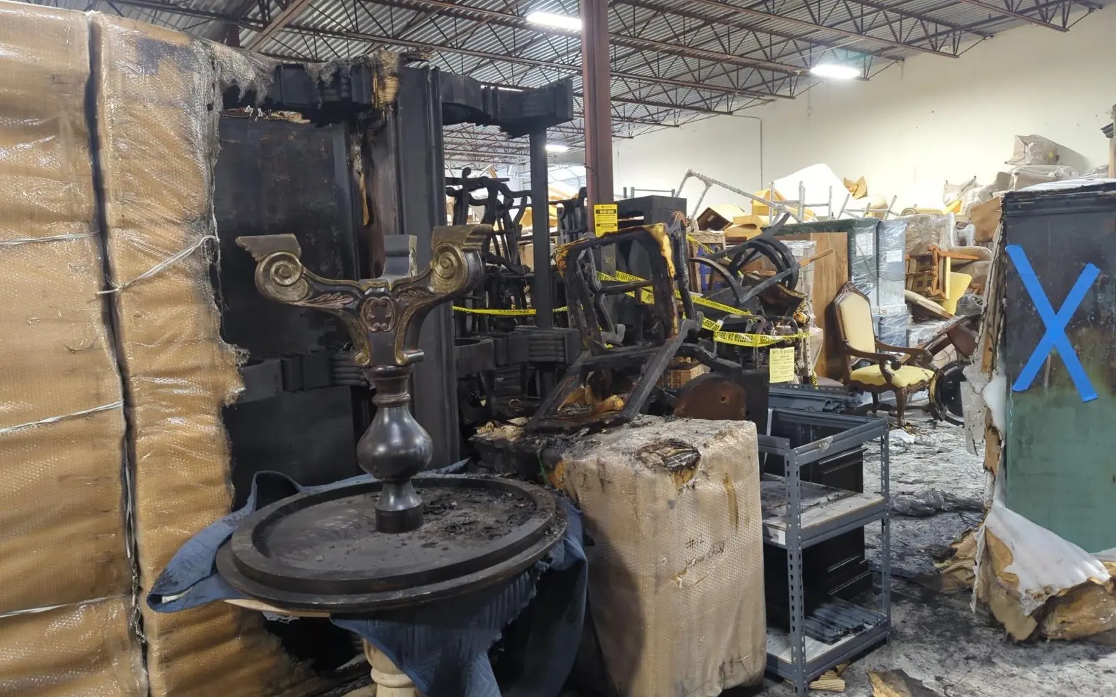 Contents tagged and marked during an inventory of fire-damaged warehouse stock and equipment